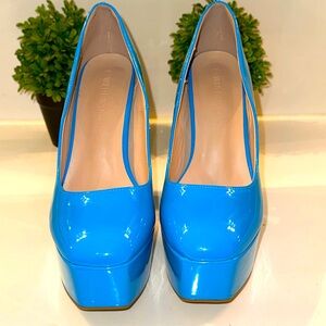 Wild Diva blue patent high heel platform pumps. Size 10.